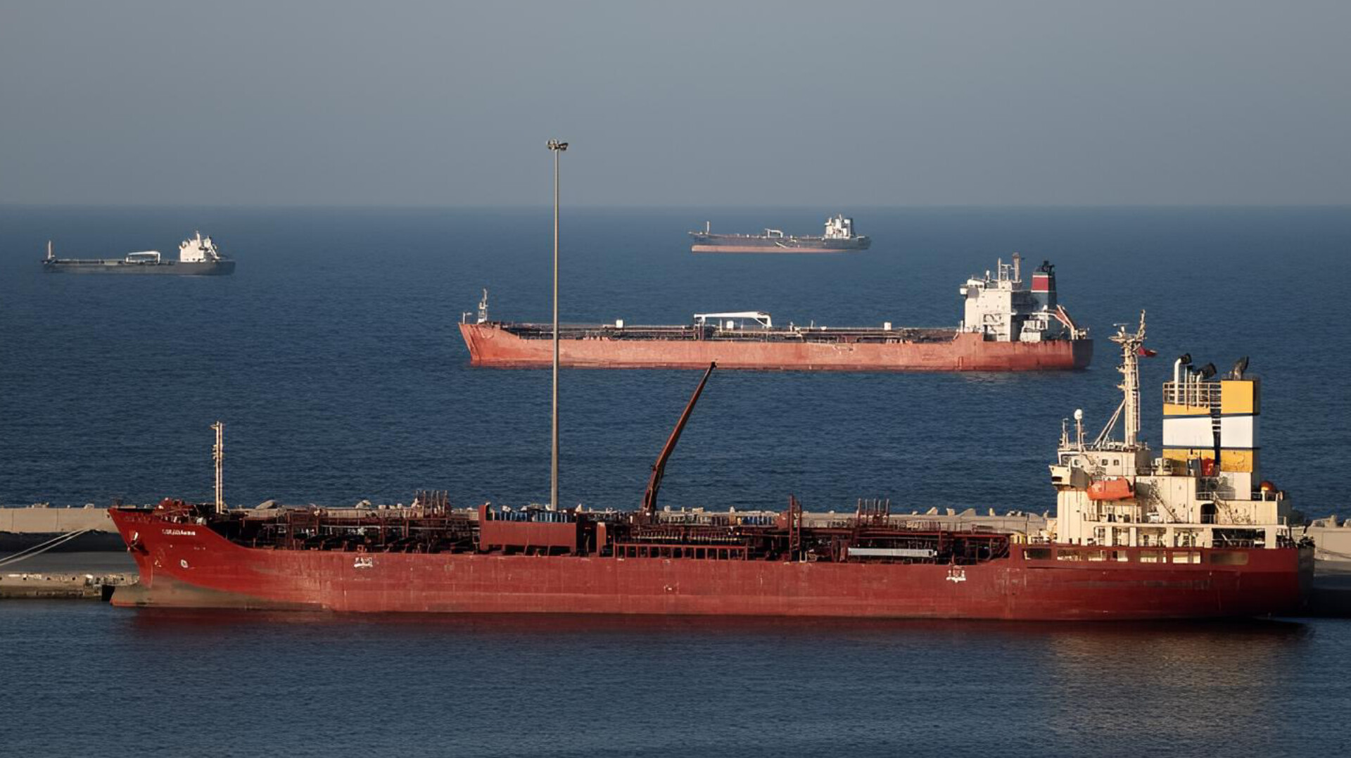 Large oil tanker traveling through the Strait of Hormuz, one of the world’s most important oil shipping routes.