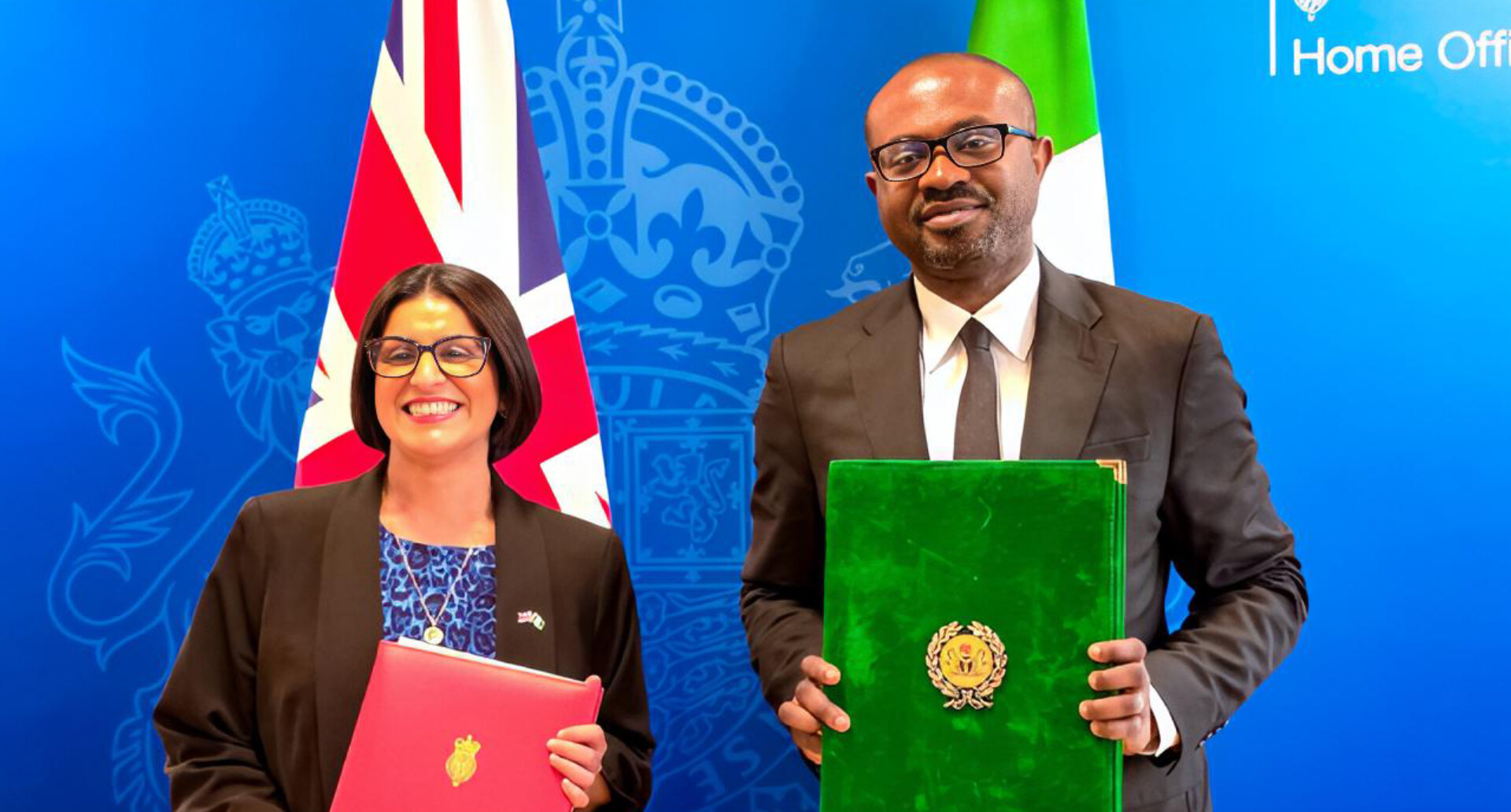 Image of Olubunmi Tunji-Ojo and Shabana Mahmood signing bilateral agreement on deportation of failed asylum seekers and